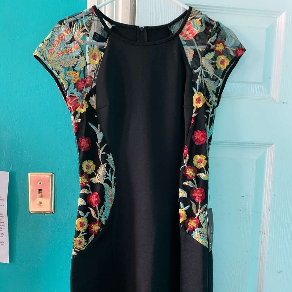 Fitted black midi dress